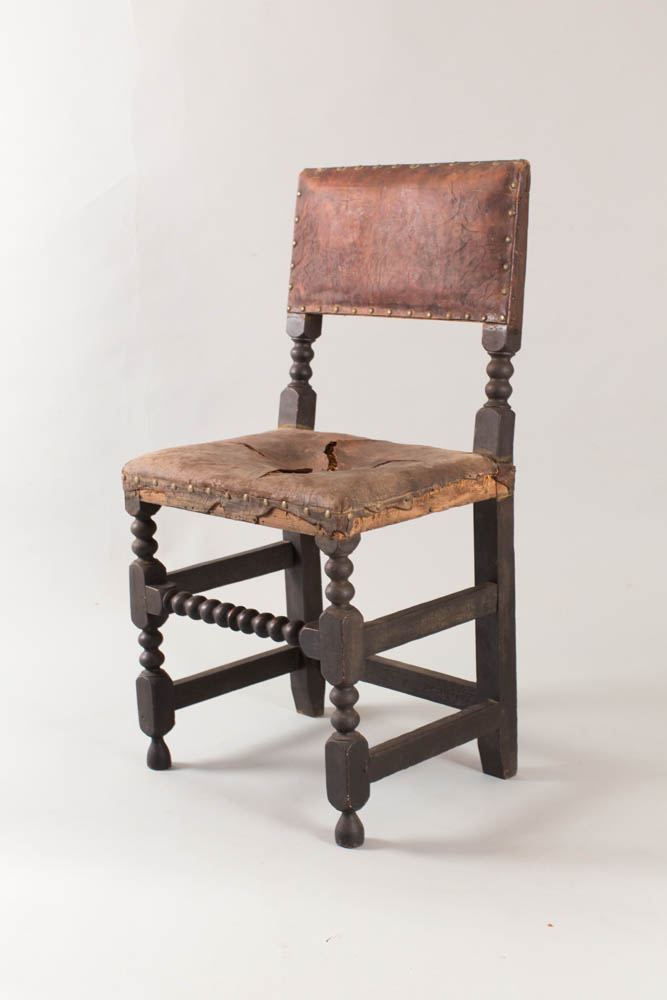 An exceptionally rare 17th century turned 'leather' chair