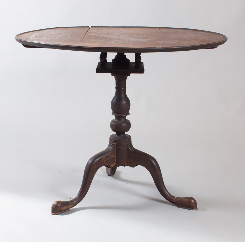 A very fine birdcage walnut tea or breakfast table