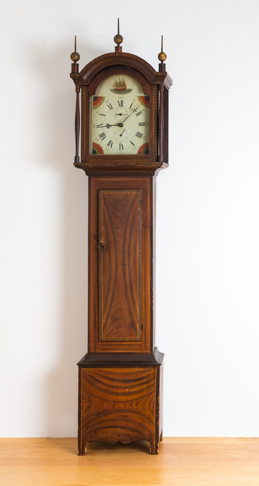 An exceptional painted cased wooden works tall clock