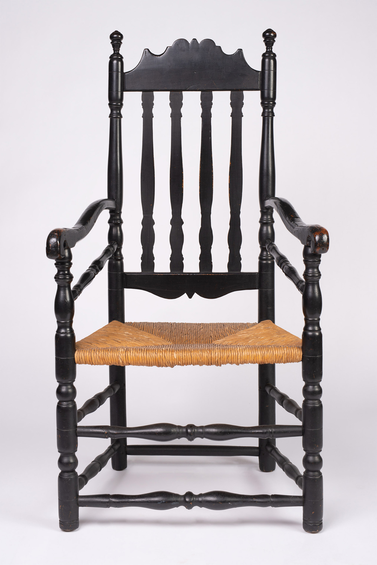 A very fine maple William and Mary banister-backed armchair